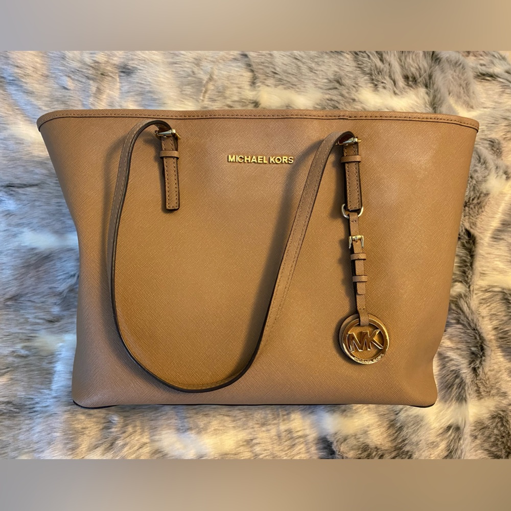 Large Michael Kors Shoulder Tote. Tan in color.